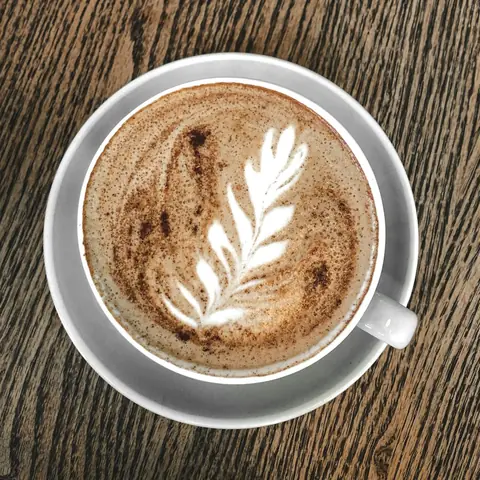 Cafe latte with leaf latte art